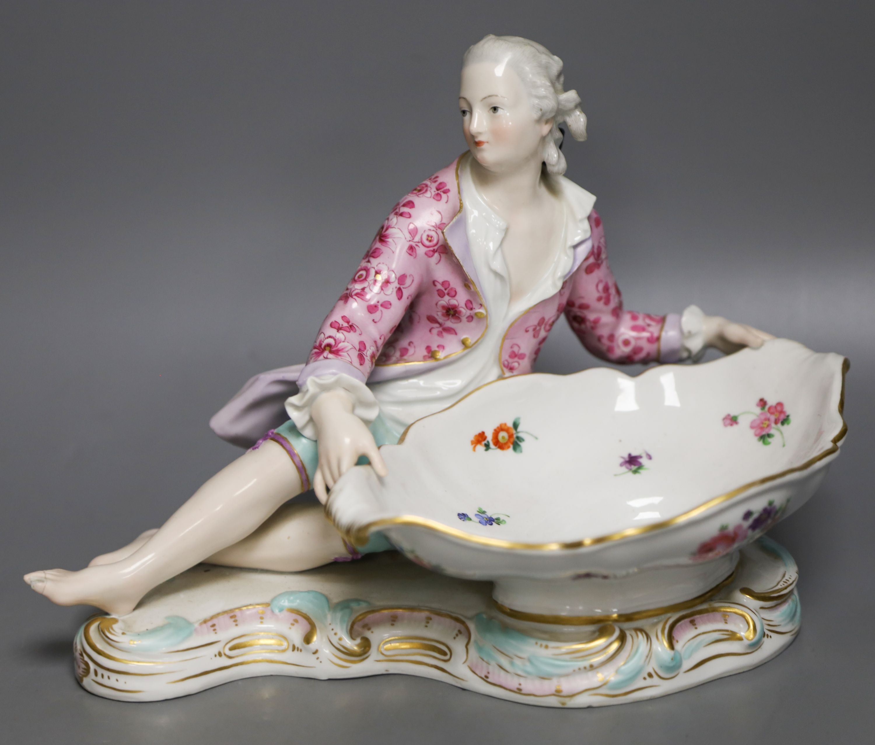 A 19th century Meissen figural sweetmeat dish, incised number 2863 30cm